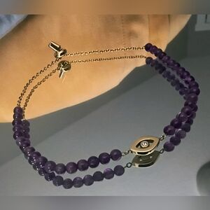 Fossil Purple Beaded Bracelet with Eye Pendant